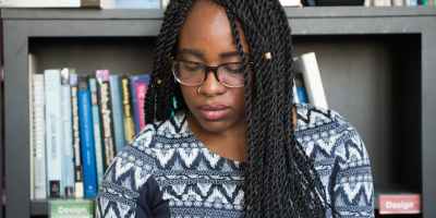 Black woman reading book